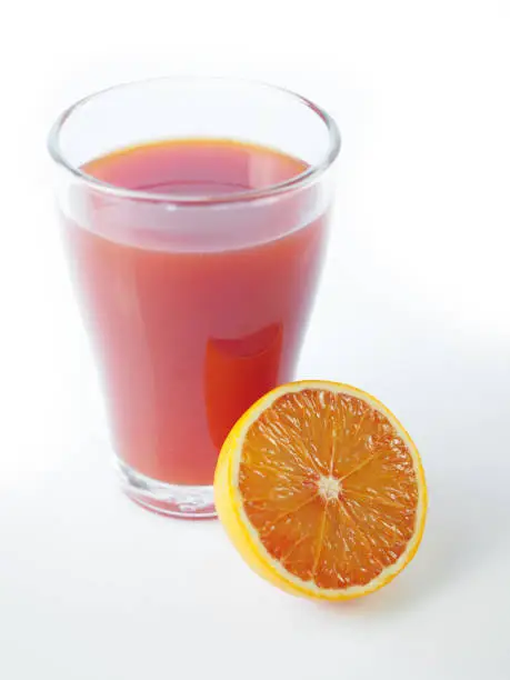 Citrus fruit juice pressed in a glass. Exempt. Glass. Orange. Citrus. Vitamin.
