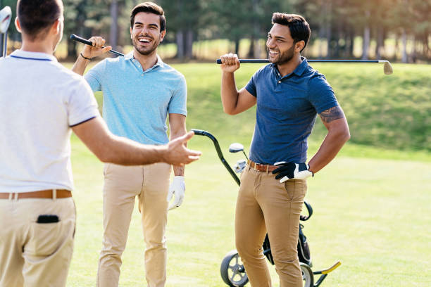 istock Group of golfers having fun together 1133871964