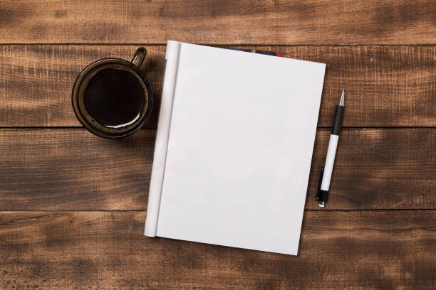 istock Mock-up magazine or catalog on wooden table. Blank page or notepad on wood background. Blank page or notepad for mockups or simulations 1133877344