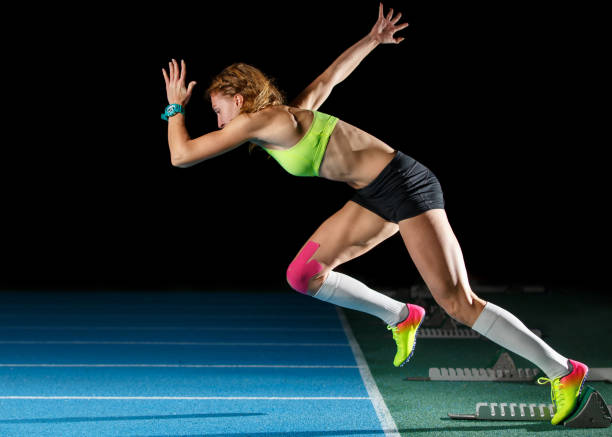 istock Female athlete starting her sprint race running 1133877709