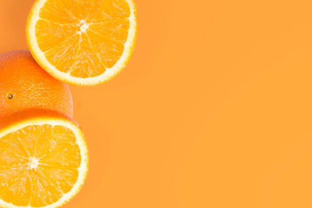 Sliced Orange On Orange Background