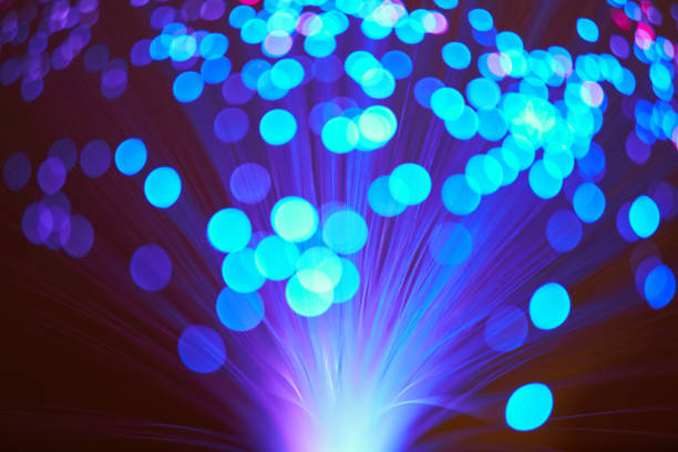istock Blurred LED screen closeup. Glowing threads in a color spectrum on a black background. Bright abstract background ideal for any design 1133878651