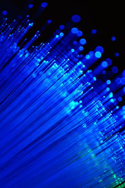 istock Blurred LED screen closeup. Glowing threads in a color spectrum on a black background. Bright abstract background ideal for any design 1133878726