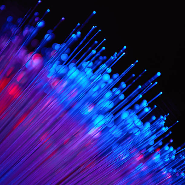 istock Blurred LED screen closeup. Glowing threads in a color spectrum on a black background. Bright abstract background ideal for any design 1133878737