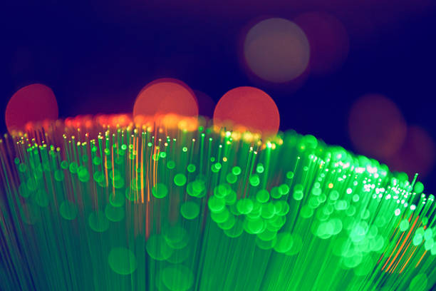 istock Blurred LED screen closeup. Glowing threads in a color spectrum on a black background. Bright abstract background ideal for any design 1133878810