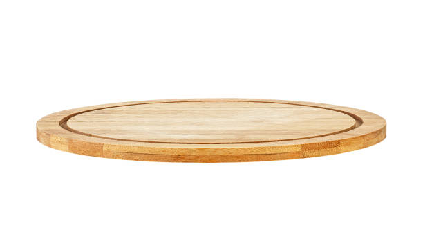 istock Wooden cutting board for pizza isolated on white background 1133880553
