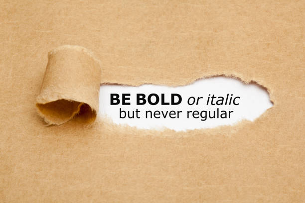Be Bold Or Italic But Never Regular Inspirational quote Be Bold Or Italic But Never Regular appearing behind torn paper. Concept about the importance of being different and standing out from the crowd. niche photos stock pictures, royalty-free photos & images
