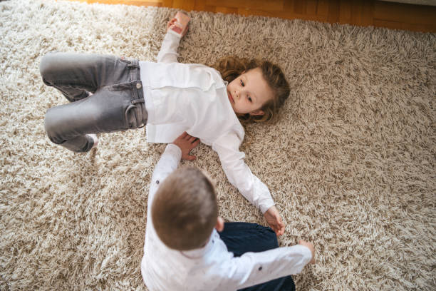 istock Playful brother and sister 1133884875