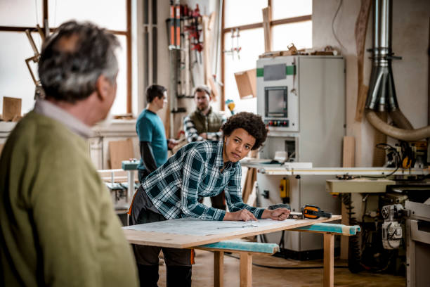 istock Portrait of an elderly man in a carpenter's workshop 1133887581