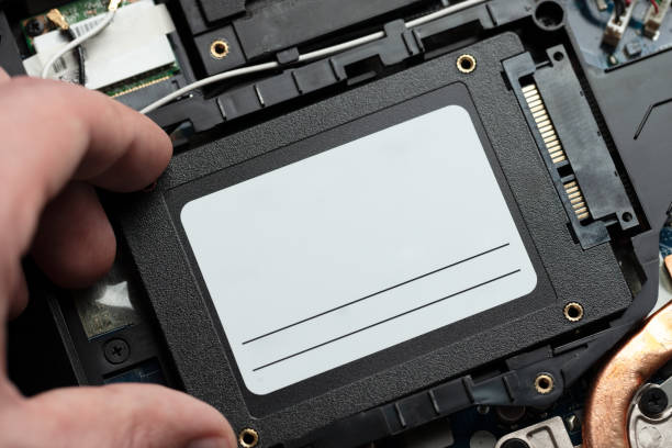 installing new solid-state drive to laptop pc. sata and power connection close up.upgrade laptop hardware.