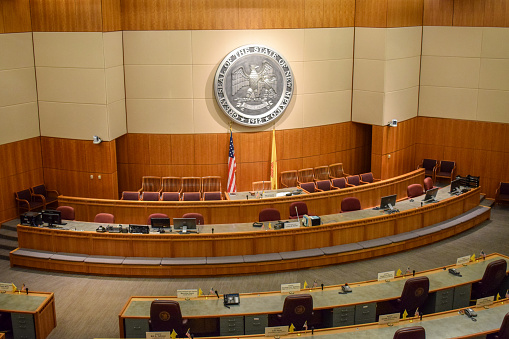 Empty House of Representatives chamber within the New Mexico State Capitol in Santa Fe. Photo taken in December 2017.