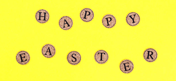 istock Easter concept. Inscription in colored letters Happy Easter on a yellow background.Top View. Flat Lay 1133896882
