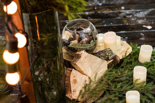 istock Wedding table decorated with flowers, logs, candles, dinner at the restaurant, wedding. 1133896954