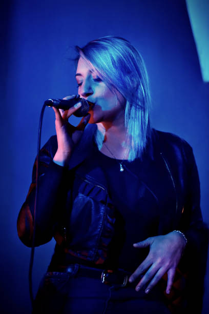 istock singer woman live show 1133897429