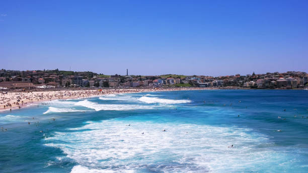 istock surfers at bondi beach in sydney, aust 1133900366