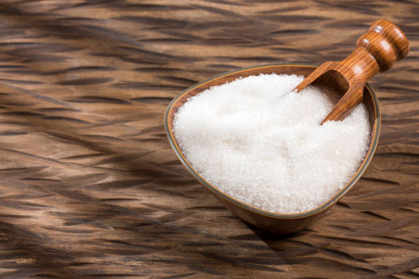 istock White granulated sugar and refined sugar 1133905401