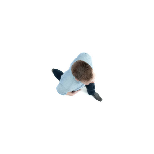 istock Directly above view of man walking 1133912107