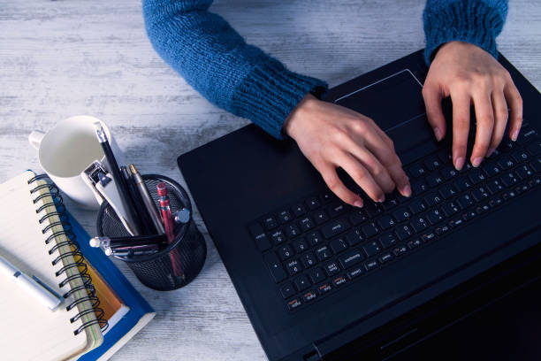 istock businesswoman typing keyboard 1133914812