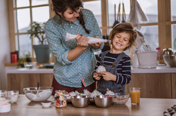 istock Helping His Mom to Make Birthday Muffins 1133919505