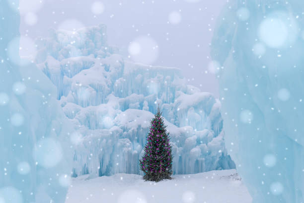 christmas tree with twinkling lights standing in an ice castle horizontal image of a christmas tree with twinkling lights sitting in the middle of a dreamy blue ice castle with large blurred snowflakes falling in the foreground on a cold winter wonderland kind of day with lots of copy space. icicle snowflake winter brilliant stock pictures, royalty-free photos & images
