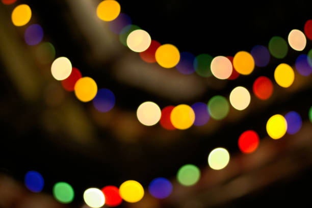 istock abstract blurred glowing red and yellow lights of different colors 1133930716