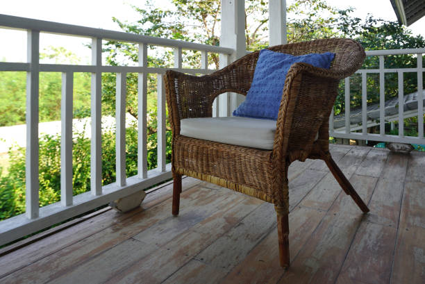 istock Old vintage rattan chair on terrace deck 1133933716