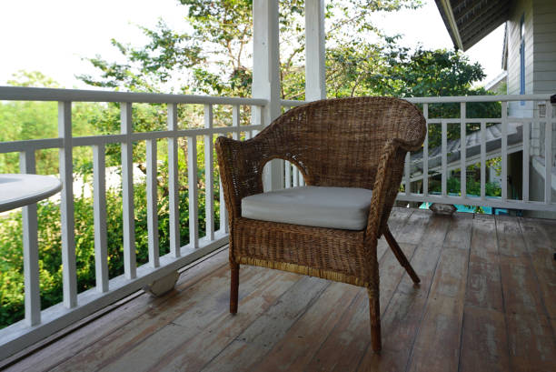 istock Old vintage rattan chair on terrace deck 1133933720