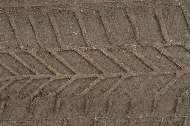 istock tire print on ground 1133933936