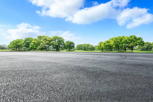 istock Car circuit road ground and green forest in summer 1133941791