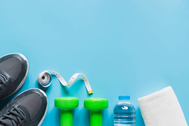 istock Top view flat lay healthy object with dumbbells, bottle water for sport or exercise concept. 1133946280