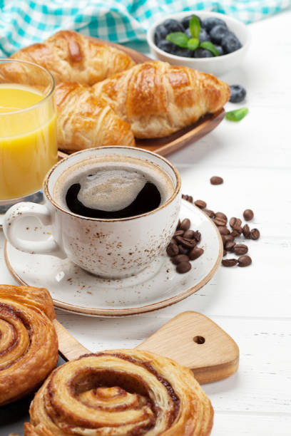 istock Coffee, juice and croissants breakfast 1133951322