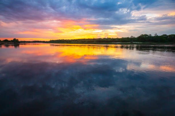 istock Landscape with a beautiful colorful sunset before the rain 1133954507