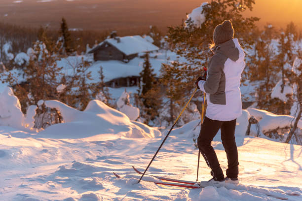 istock Woman cross country skiing 1133957067