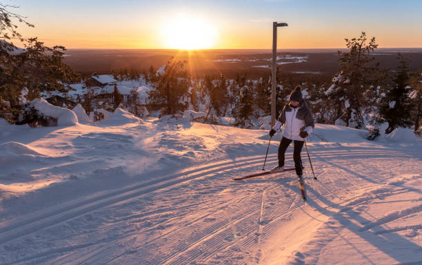 istock Woman cross country skiing 1133957069