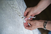 Lace white wedding dress, hand-tied look.