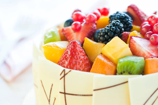 cream cake with fruits and white chocolate still life