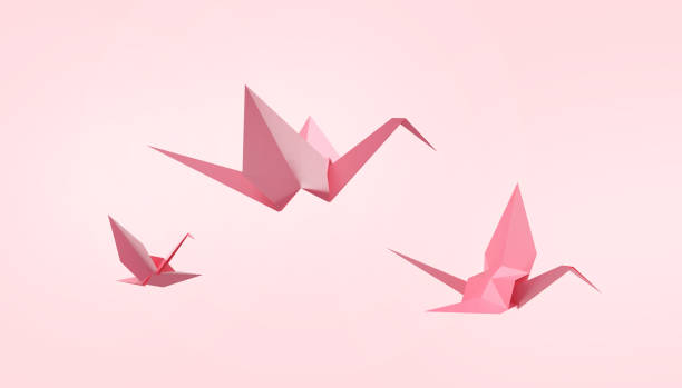 istock Folding birds Paper and peace on Pastel Pink Background - 3d rendering 1133962588