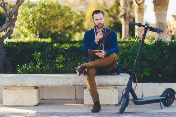 istock Businessman in Valencia using tablet in the park 1133966602