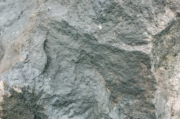 Photo of Old natural grey stone texture background.