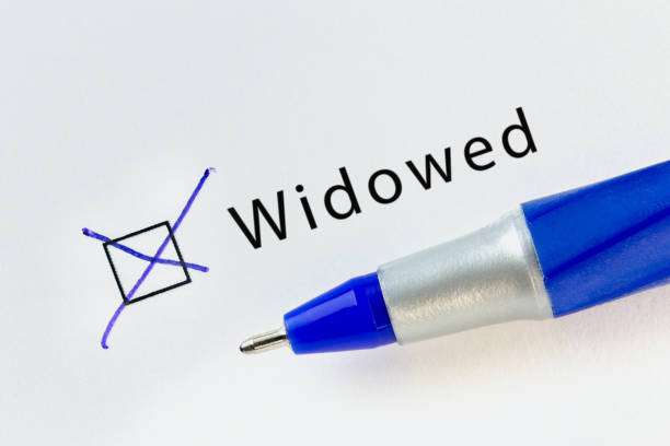 istock Widowed - checkbox with a cross on white paper with blue pen. 1133966740