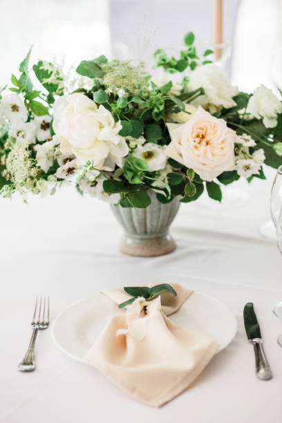 istock wedding table decorated by plates, knives and forks 1133968977