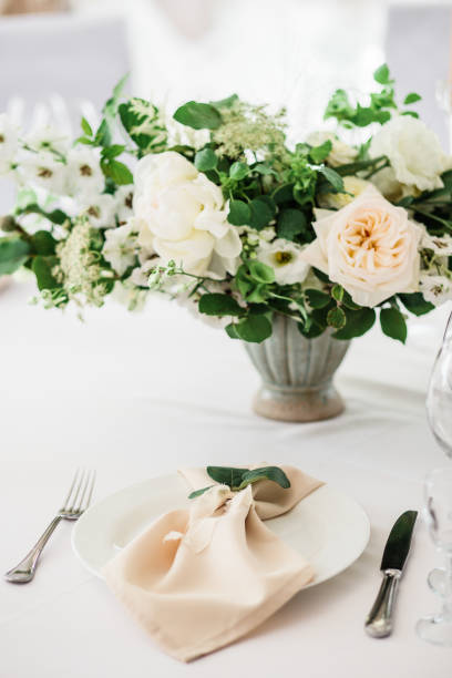 istock wedding table decorated by plates, knives and forks 1133968991