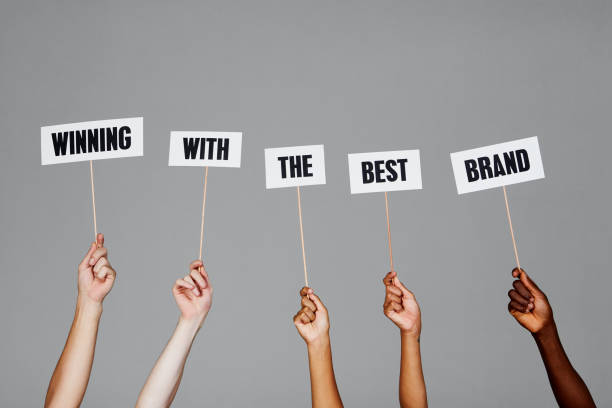 istock Hands hold signs reading 