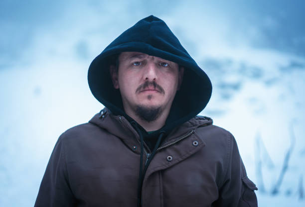 istock Portrait of man outdoors in winter 1133974385