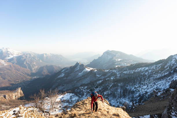istock Mountain climber going up on the mountain ridge 1133978372