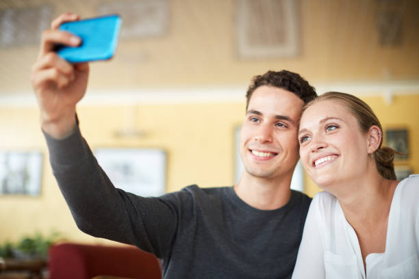 istock Happy young couple take smiling selfie 1133978646
