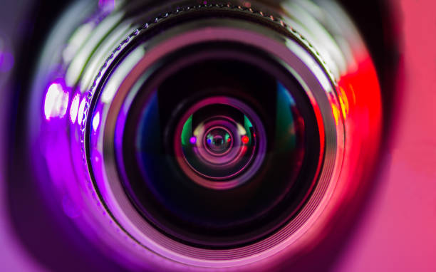 istock The camera lens and light purple-red 1133982556