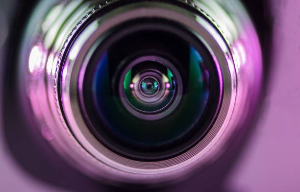 istock The camera lens and light purple 1133982598