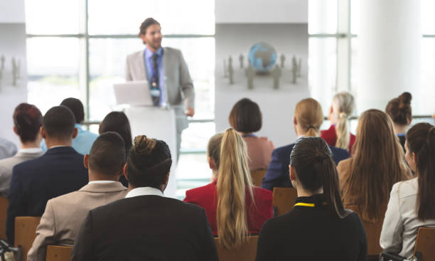 istock Group of business people attending a seminar 1133985554