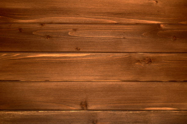 Horizontal wall of wooden brown boards. A bright abstract background is perfect for any design. Main background for design Horizontal wall of wooden brown boards. A bright abstract background is perfect for any design. Main background for design work tool nail wood construction stock pictures, royalty-free photos & images